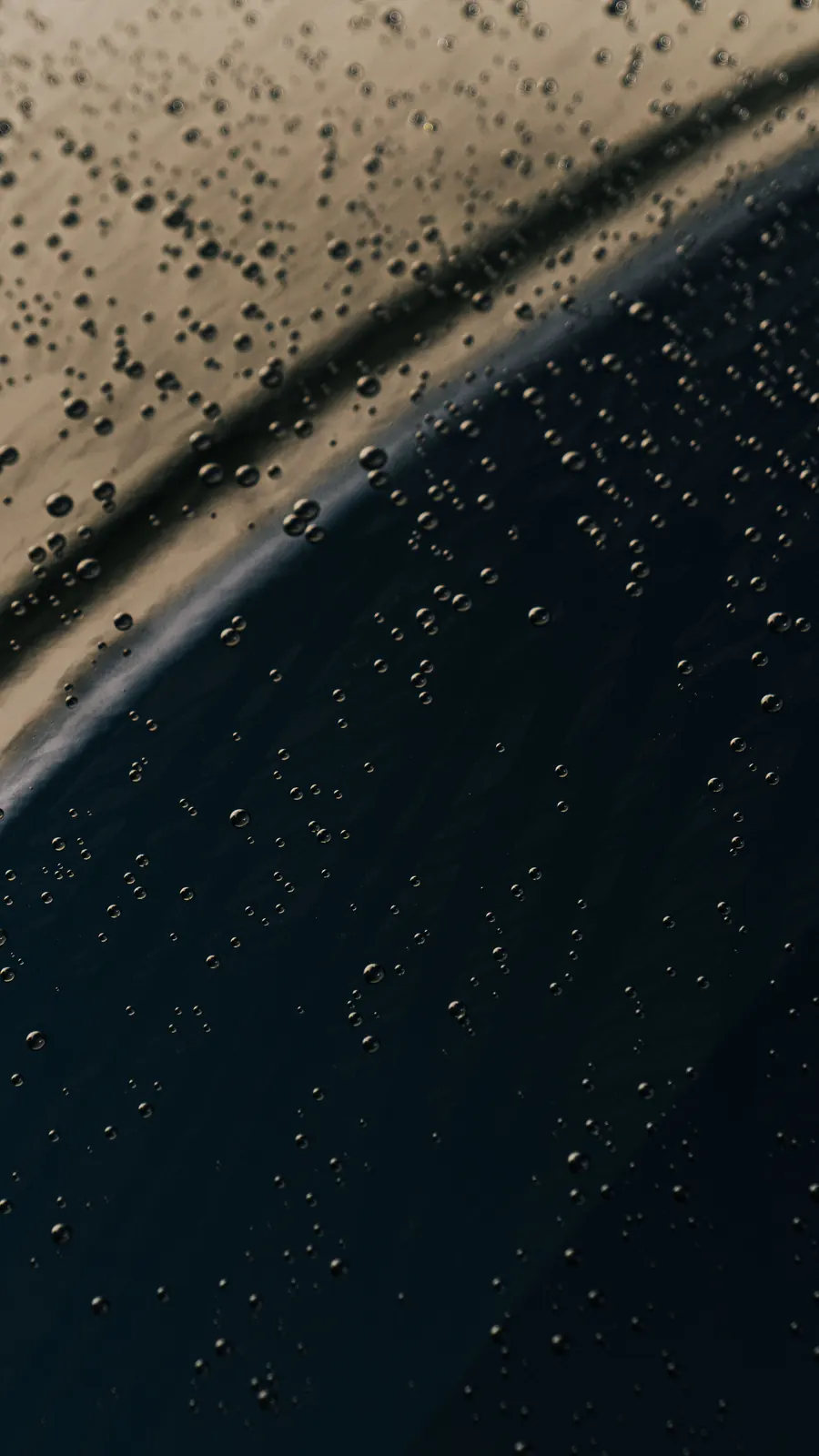 Water beading on a ceramic-coated roof during a maintenance wash
