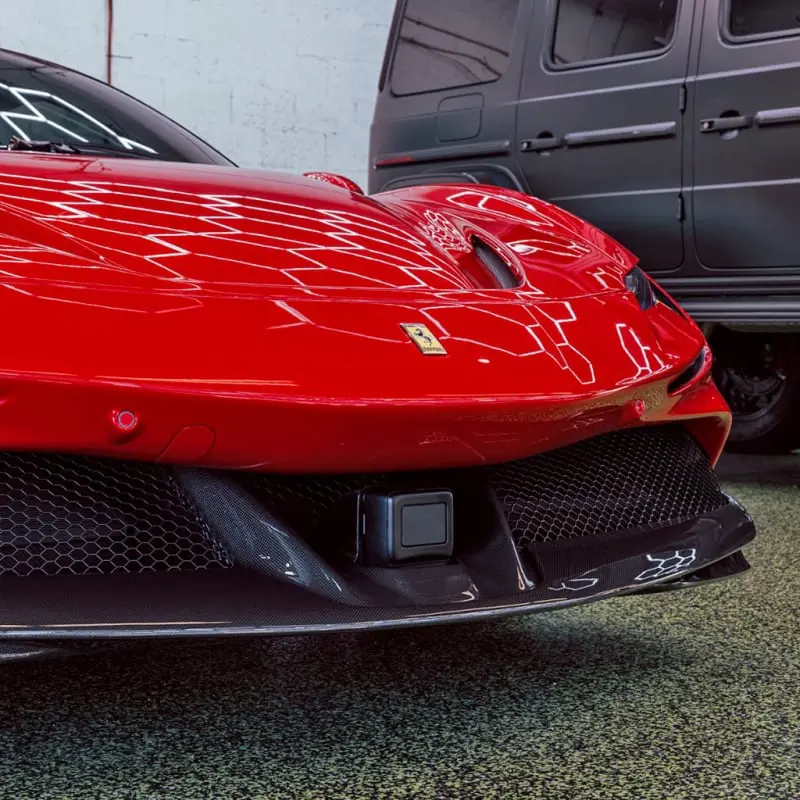 Carbon fiber body kit on a Ferrari at Ecophant Auto Boca Raton