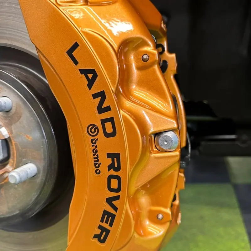 Painted calipers on a Land Rover at Ecophant Auto Boca Raton