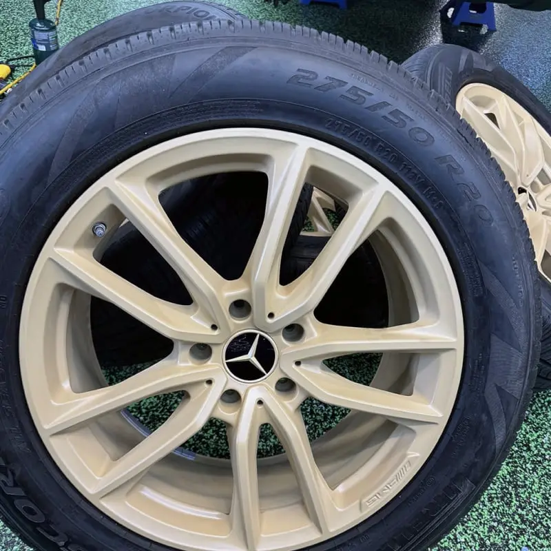 Aftermarket cream wheel at Ecophant Auto Boca Raton