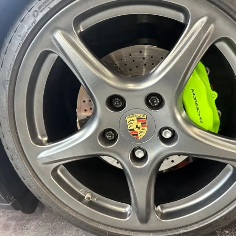 Aftermarket grey wheel at Ecophant Auto Boca Raton