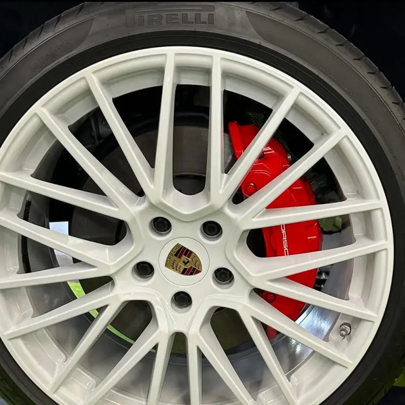 Aftermarket white wheel at Ecophant Auto Boca Raton