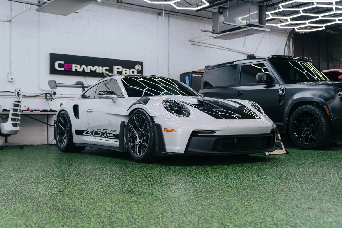 White Porsche 992 GT3 RS inside the Ecophant Auto studio in Boca Raton